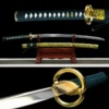 A Japanese Samurai Katana sword, displayed on a wooden stand along with its scabbard, and sword highlights both above and below.