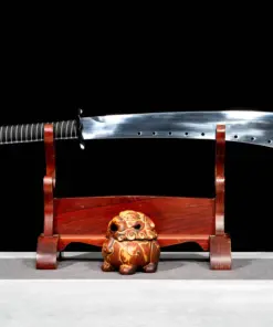 A Chinese ring sword displayed on a small wooden sword-stand.