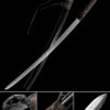 A half double edge Katana sword displayed crossed over its scabbard.