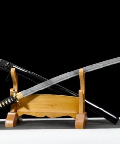 A fake Katana sword, displayed alongside its scabbard on a small wooden sword stand.