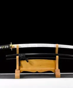 A plastic sword Katan, displayed alongside its scabbard, on a small wood sword stand.