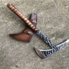 A handmade, full tang tomahawk, with a dual axe & spike head, wooden handle and leather sheath.