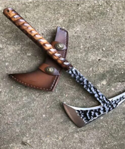 A handmade, full tang tomahawk, with a dual axe & spike head, wooden handle and leather sheath.