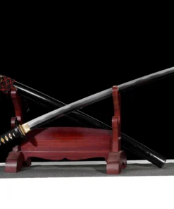 A custom Katana sword displayed next to its scabbard, leaning against a small wooden sword-stand.