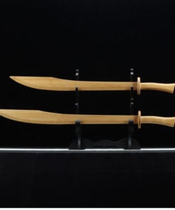 Two wooden Dao swords of differing size, displayed on a small wood sword-stand.