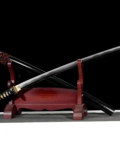 A Wootz steel sword Katana displayed next to its scabbard, leaning against a small wooden sword-stand.