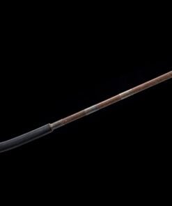 A Japanese Naginata weapon with its blade sheathed.