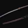 A long handle sword Nagamaki, displayed next to its scabbard.