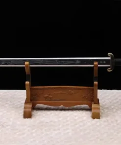 A dragon blade sword Jian, displayed on a small wooden stand.