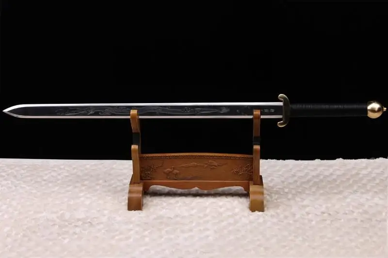 Dragon Blade Sword A dragon blade sword Jian, displayed on a small wooden stand.