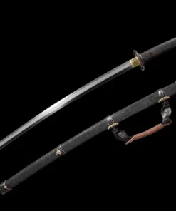A Japanese Tachi weapon sword, displayed next to its black scabbard.