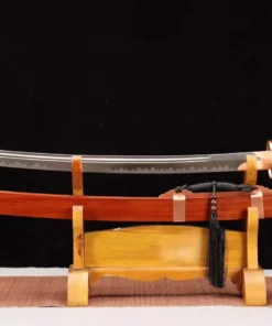 A Chinese Yaodao sword, displayed next to its scabbard, on a small wooden stand.
