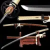 A 1060 steel sword Katana displayed next to its scabbard, leaning against a wooden stand, along with the same sword shown sheathed, and sword highlights above.