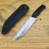 The best combat knife displayed next to its Kydex sheath, on rattan matting.