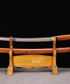 A Ko Katana sword presented in Shirasaya, displayed next to its wooden scabbard, on a small sword-stand.