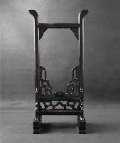 An upright vertical sword stand display.