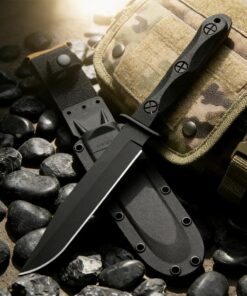 A black Marine knife displayed leaning against its scabbard and a camouflaged military bag.