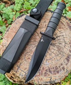 A straight blade knife displayed next to its sheath, resting on a tree-stump.
