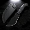 A tracker batoning knife displayed next to its sheath.