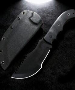 A tracker batoning knife displayed next to its sheath.