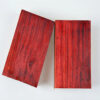 Two blocks of red blood sandalwood timber.