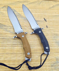 Two bugout knife models with different colored handles displayed on a rattan mat.