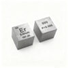 Two pure erbium metal cubes.