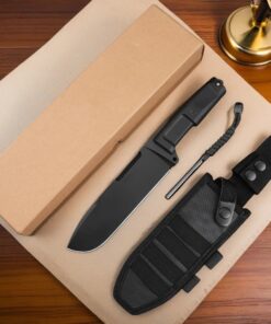 A survival knife with fire starter, displayed next to its sheath and box.