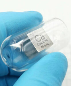 A pure calcium block cube sealed in an argon-filled glass ampoule.