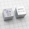 Two pure zinc cube block samples.
