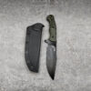 A fixed blade survival bushcraft knife, displayed next to its sheath.