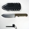 A survival knife with fire starter flint, displayed next to its Kydex sheath.