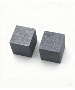Two pure tellurium metal cube samples.