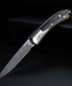 A Damascus folding bird and trout knife.
