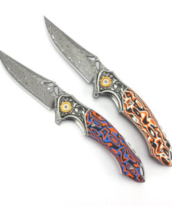 Two Damascus steel pocket folding colorful knives.