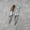 A Damascus folding knife.