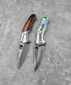 A Damascus folding knife.