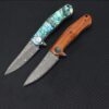Two Damascus folding knives.