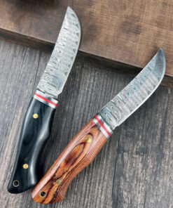 Two small Damascu skinning knife models.