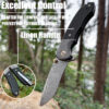 A Damascus steel pocket knife with its blade struck into a wood log, displayed against a forest background.