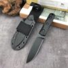 A small fixed blade knife displayed next to its sheath.