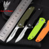 Multiple folding squirrel knife models displayed in opened and closed positions, next to a steel ruler.