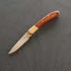 A wooden handle pocket knife