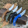 Four curved folding knife models of differing color.