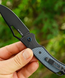 A hand holding an everyday carry pocket knife.