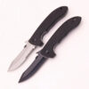 Two folding fighting knife models displayed.