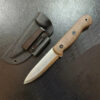 A bushcraft full tang knife displayed next to its sheath.