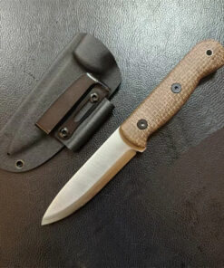 A bushcraft full tang knife displayed next to its sheath.