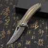 A Damascus steel liner lock knife.