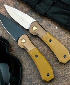 Two folding pocket clip knife models displayed.